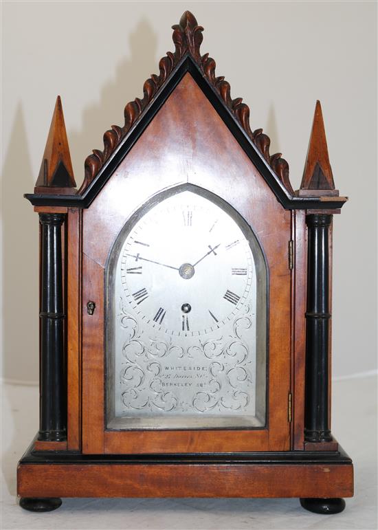 An early Victorian ebony and satinwood mantel timepiece, 13.5in.